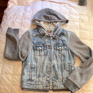 Distressed denim coat.